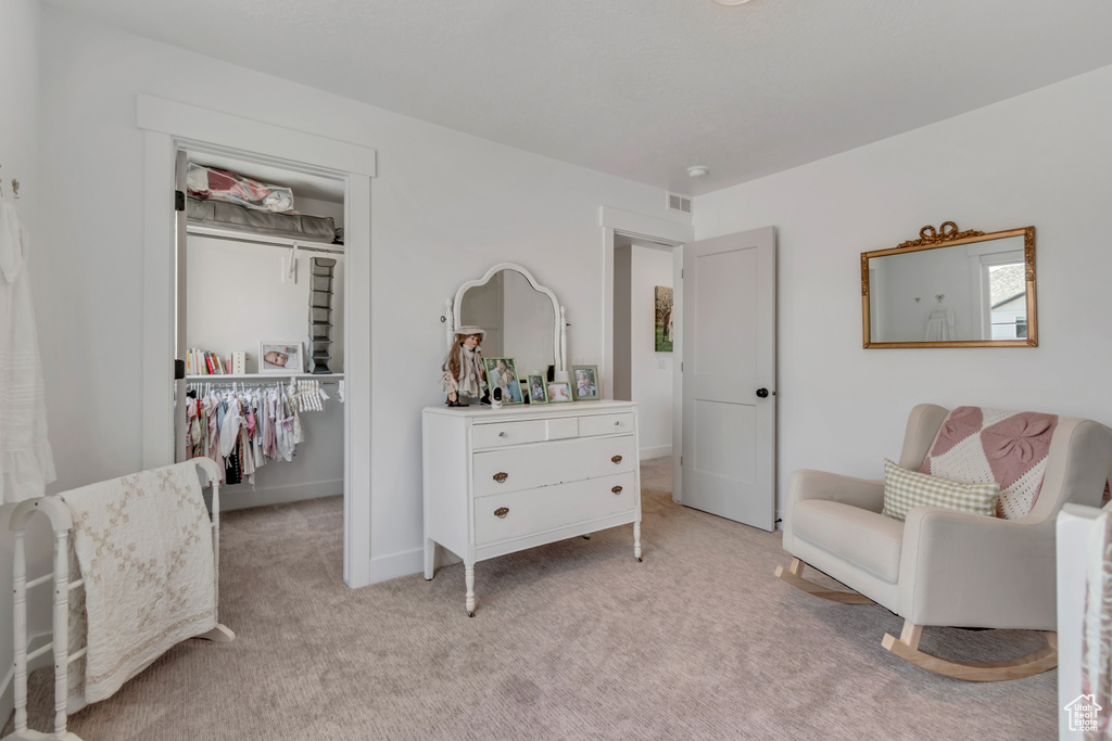 Living area featuring carpet