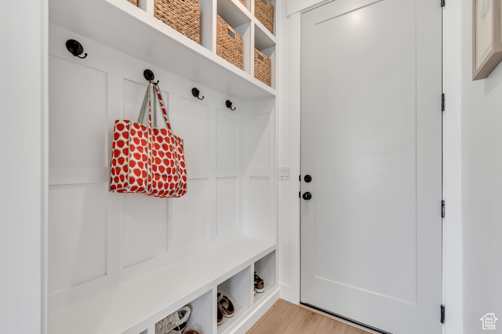 Mudroom featuring light wood-type flooring