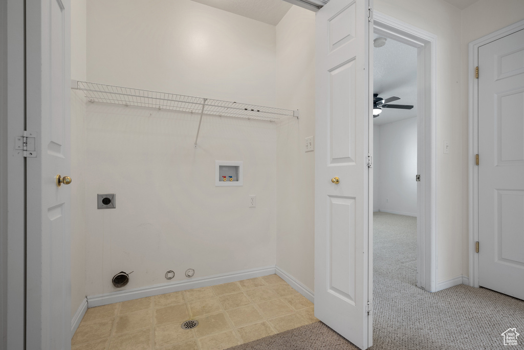 Washroom featuring gas dryer hookup, washer hookup, ceiling fan, electric dryer hookup, and carpet floors