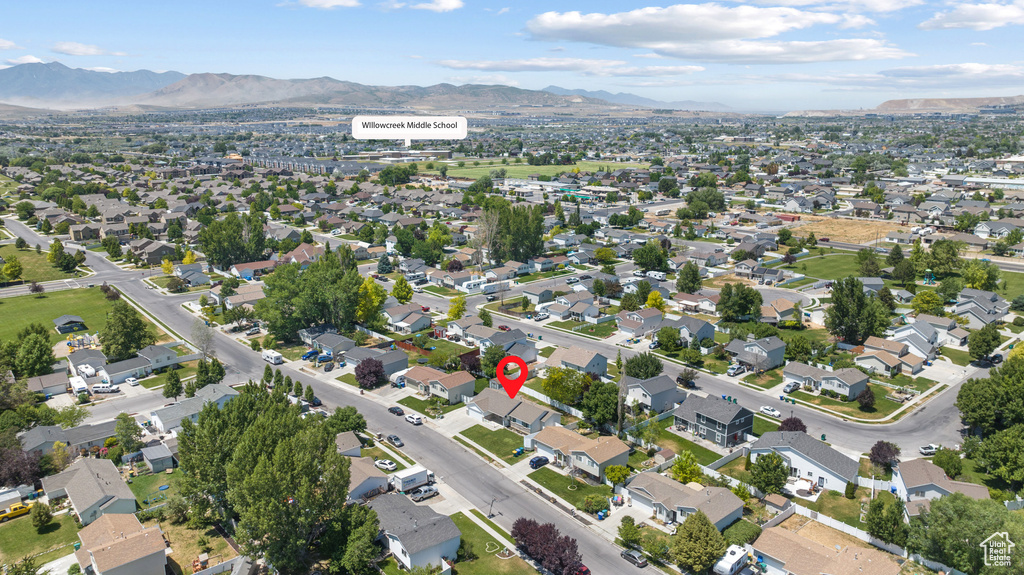 View of property location with a mountainous background and nearby suburban area