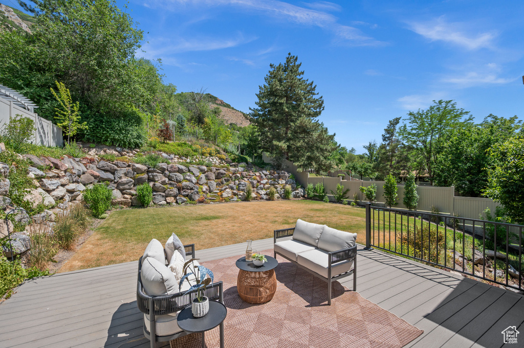 Wooden terrace with outdoor lounge area