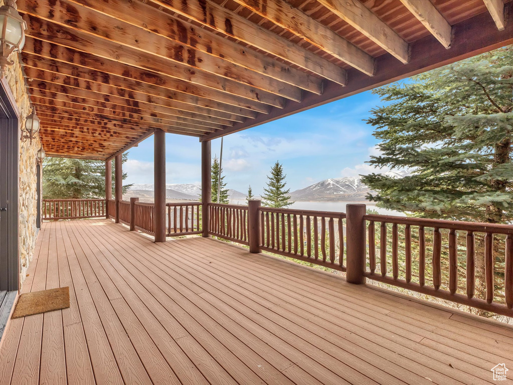 Wooden deck featuring a mountain view