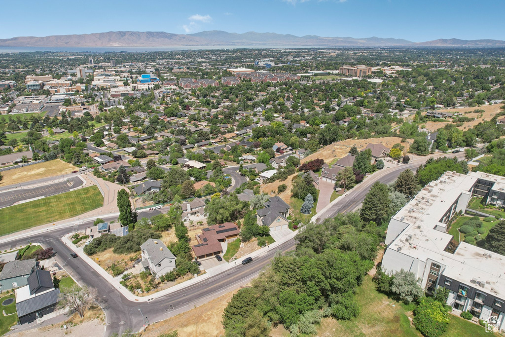 Aerial overview of property\\\'s location with a mountainous background