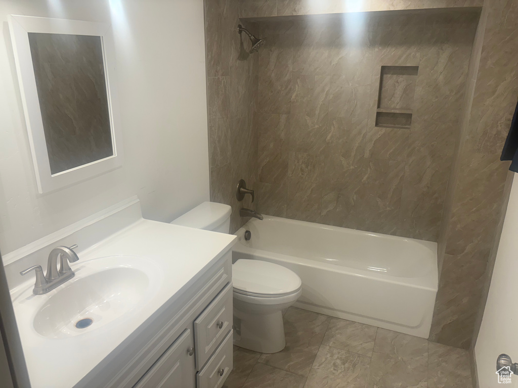 Bathroom with tub / shower combination and vanity