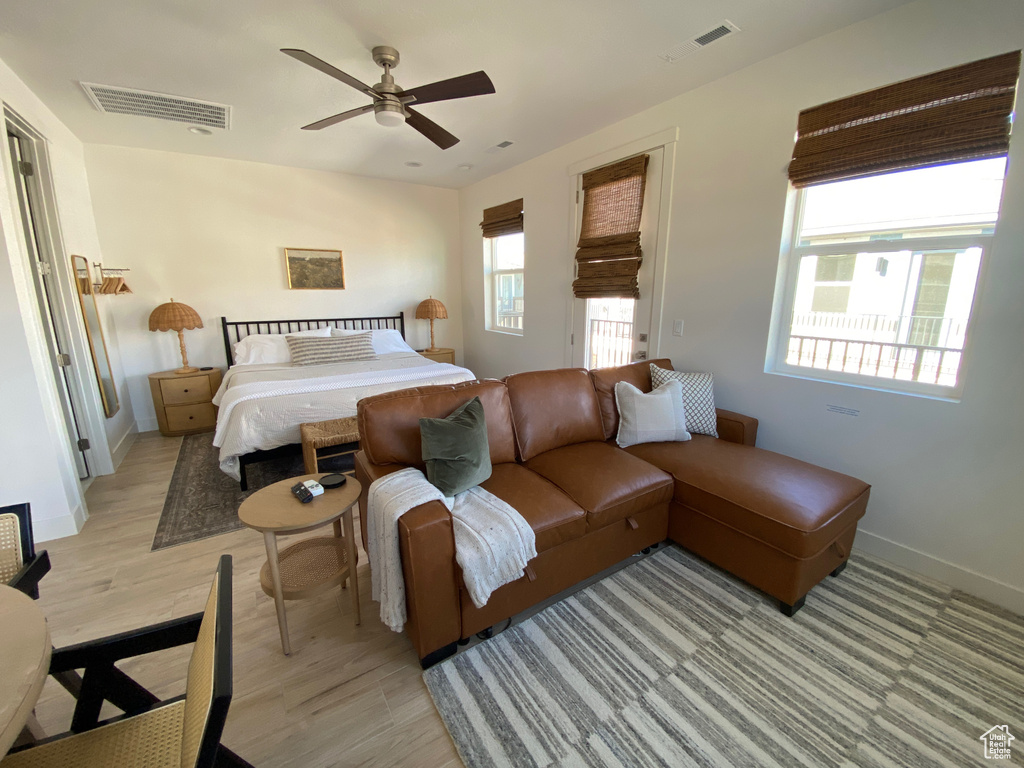 Bedroom with baseboards and a ceiling fan