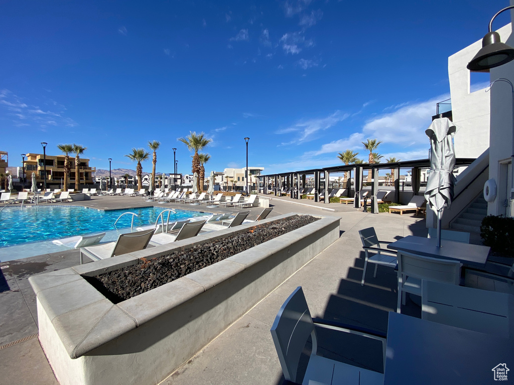 Community pool with a fire pit