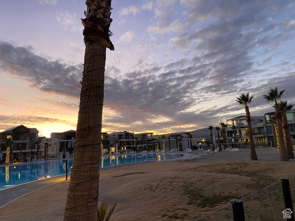 Community pool featuring a residential view