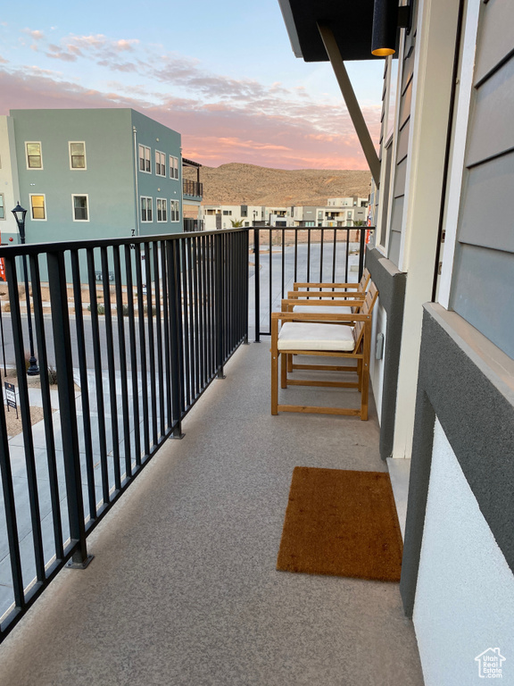 Balcony at dusk with a water view