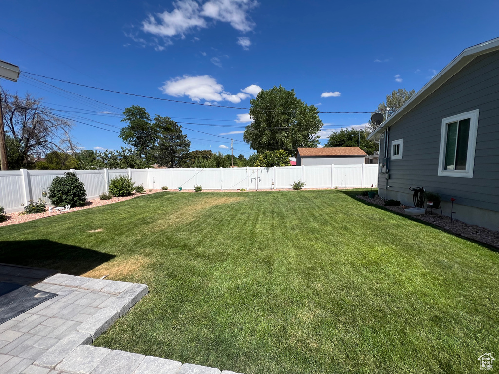 View of fenced backyard