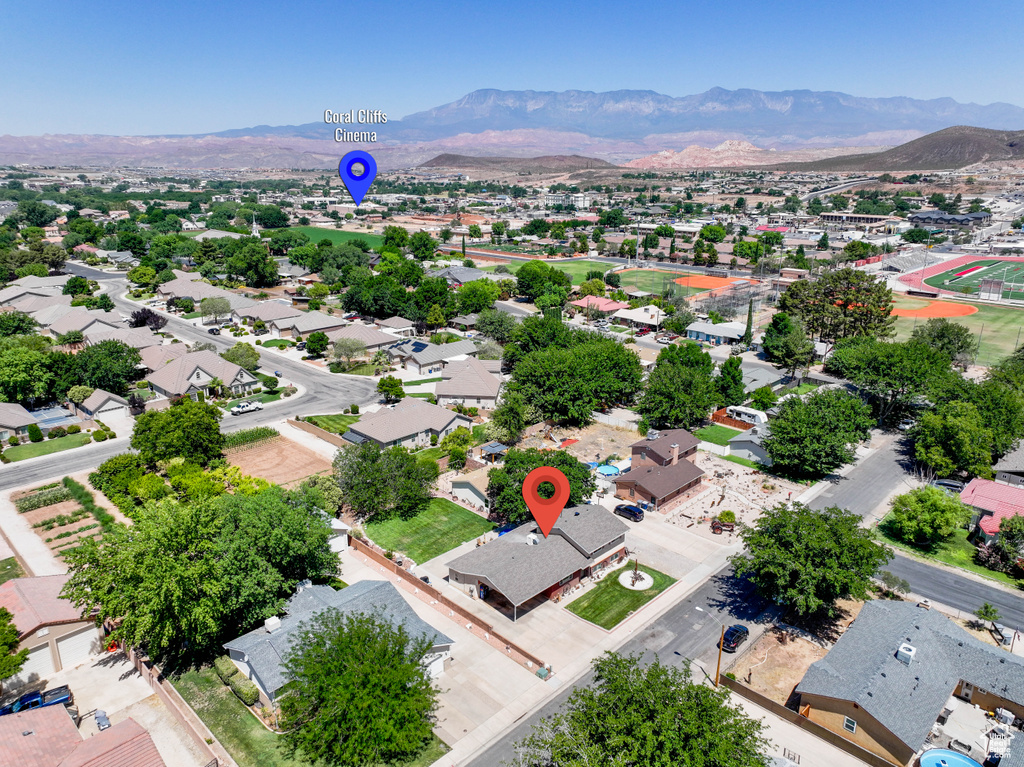 Aerial view of residential area with a mountainous background