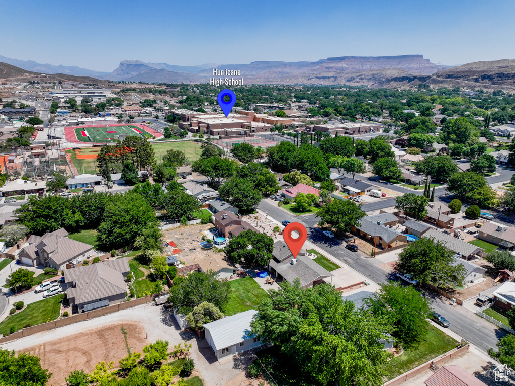 Aerial view of residential area with a mountainous background