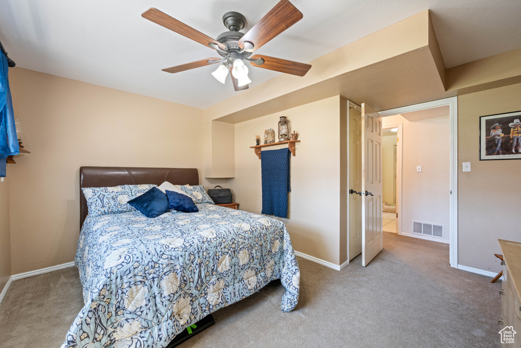 Bedroom featuring carpet and a ceiling fan