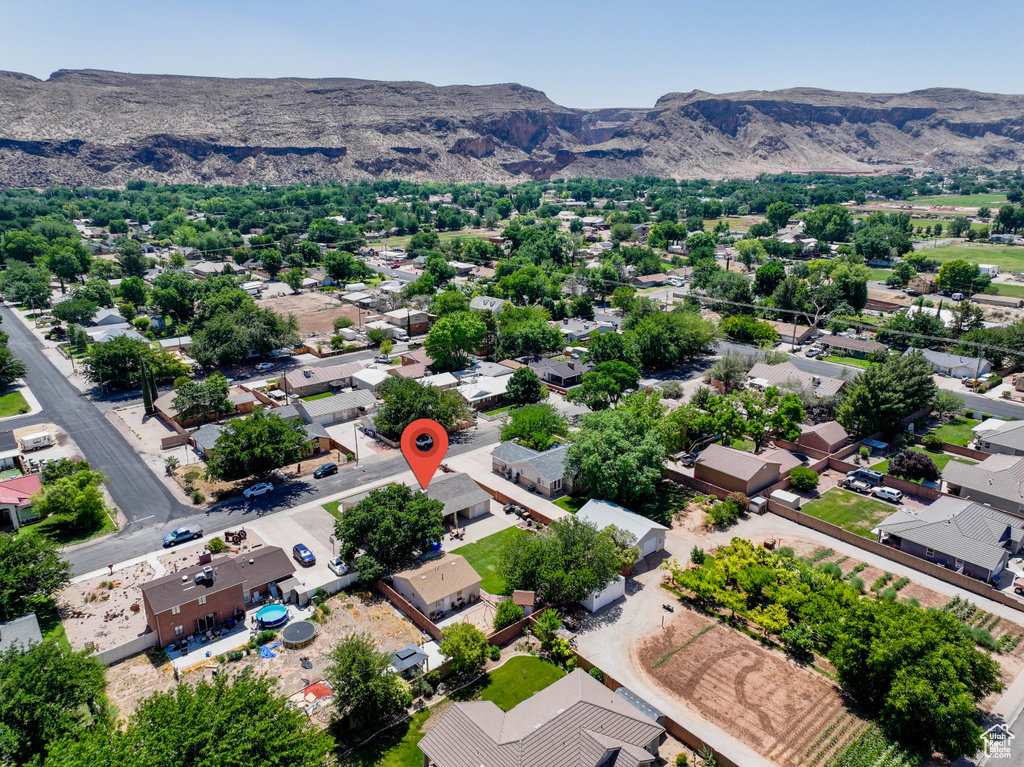 Aerial view of residential area featuring mountains