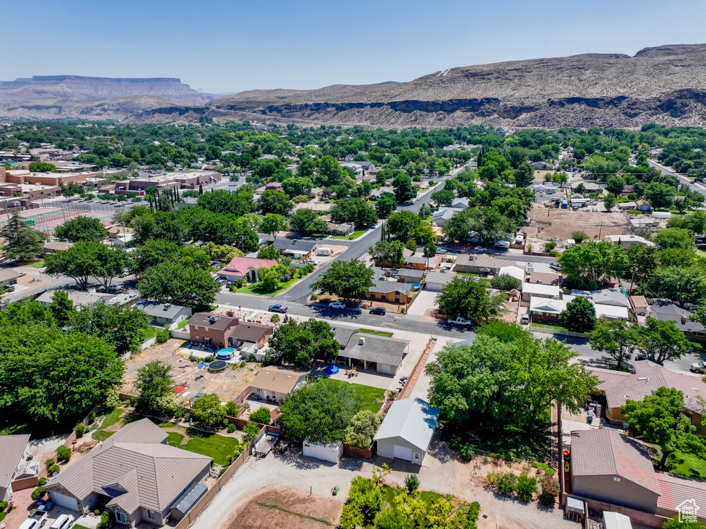Aerial view of residential area featuring mountains