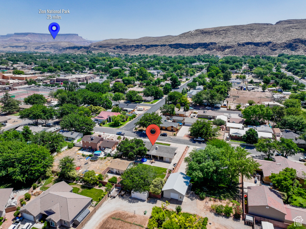 Aerial view of residential area with mountains