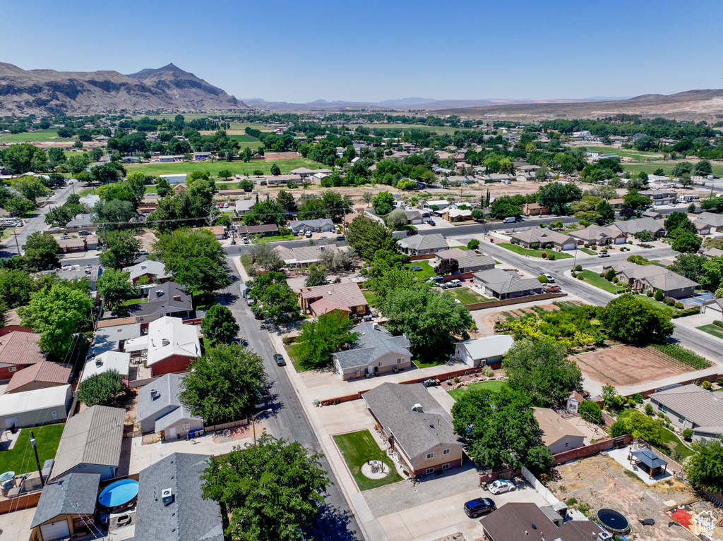 Aerial view of residential area with a mountain backdrop