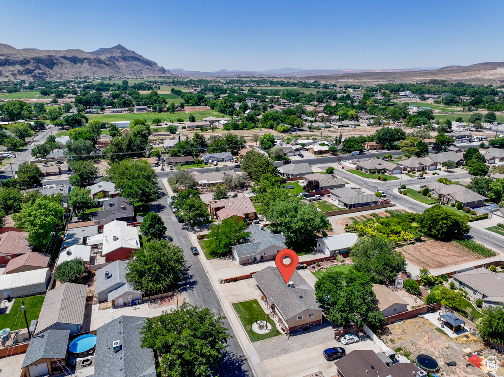 Aerial perspective of suburban area featuring mountains
