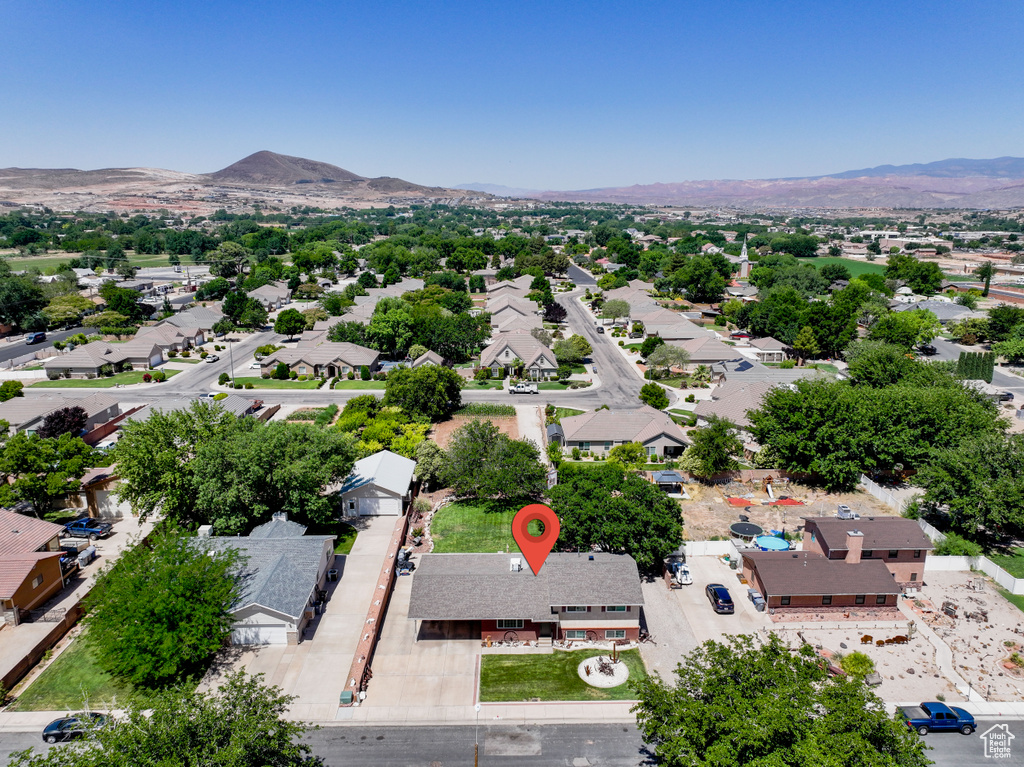 Aerial view of residential area with mountains