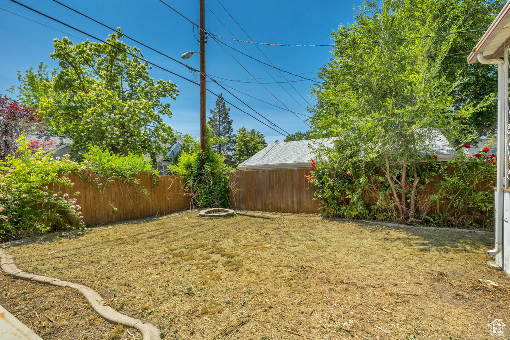 View of fenced backyard