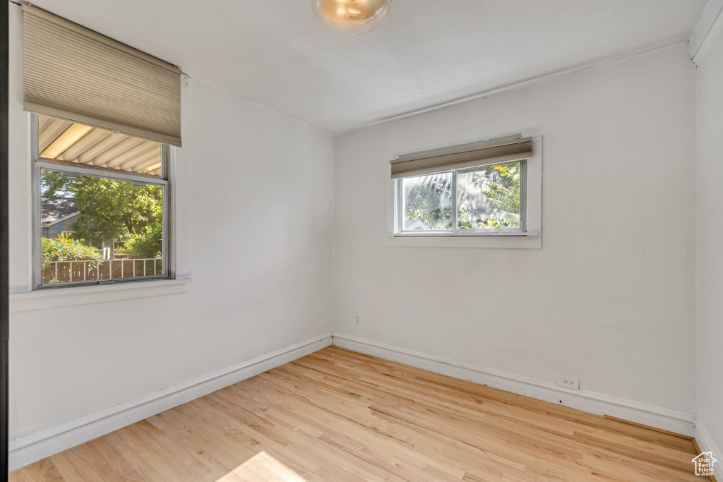 Empty room with wood finished floors