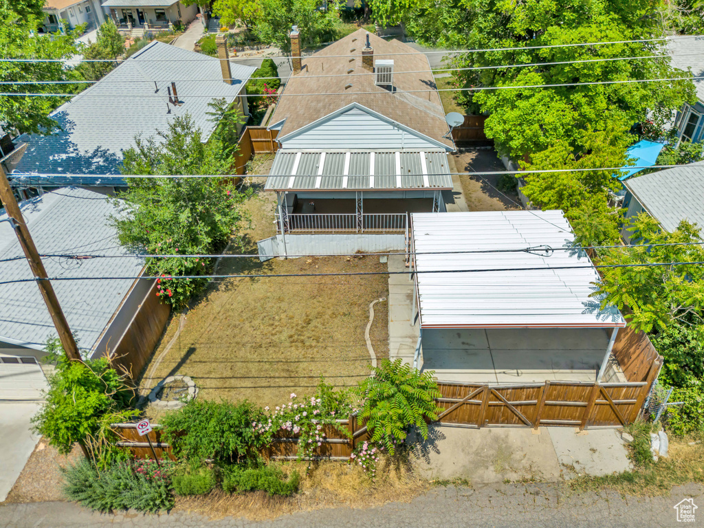Aerial view of property and surrounding area with property parcel outlined