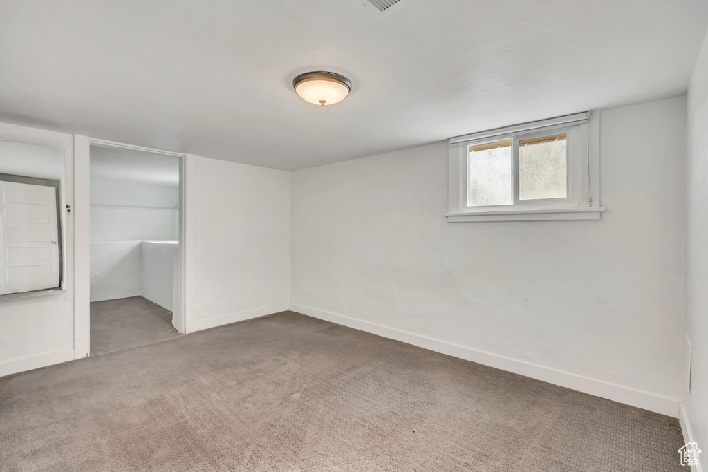Unfurnished bedroom with carpet floors and a closet