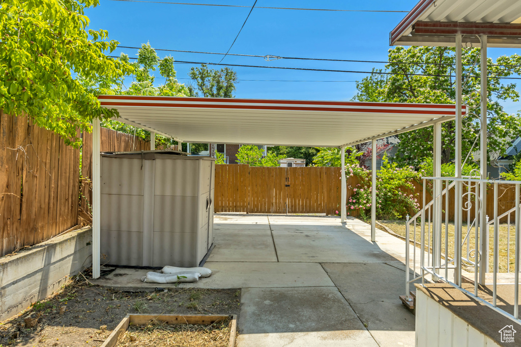View of patio / terrace with a carport