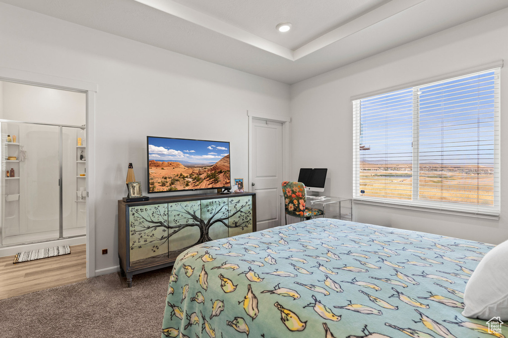 Carpeted bedroom with recessed lighting and baseboards