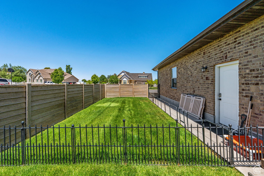 View of fenced backyard