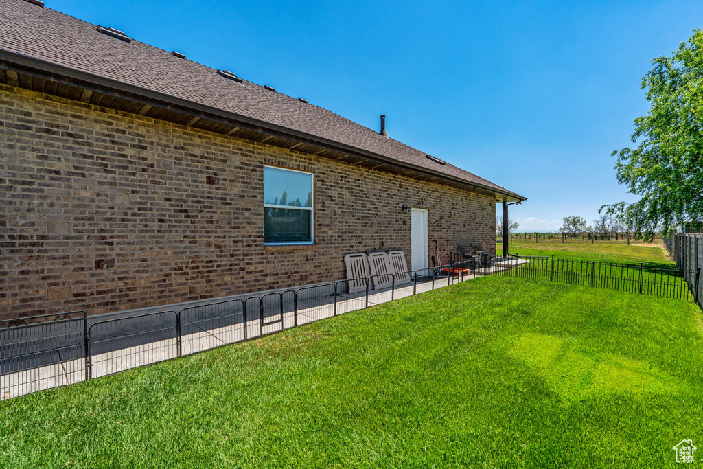 Fenced backyard featuring a patio area