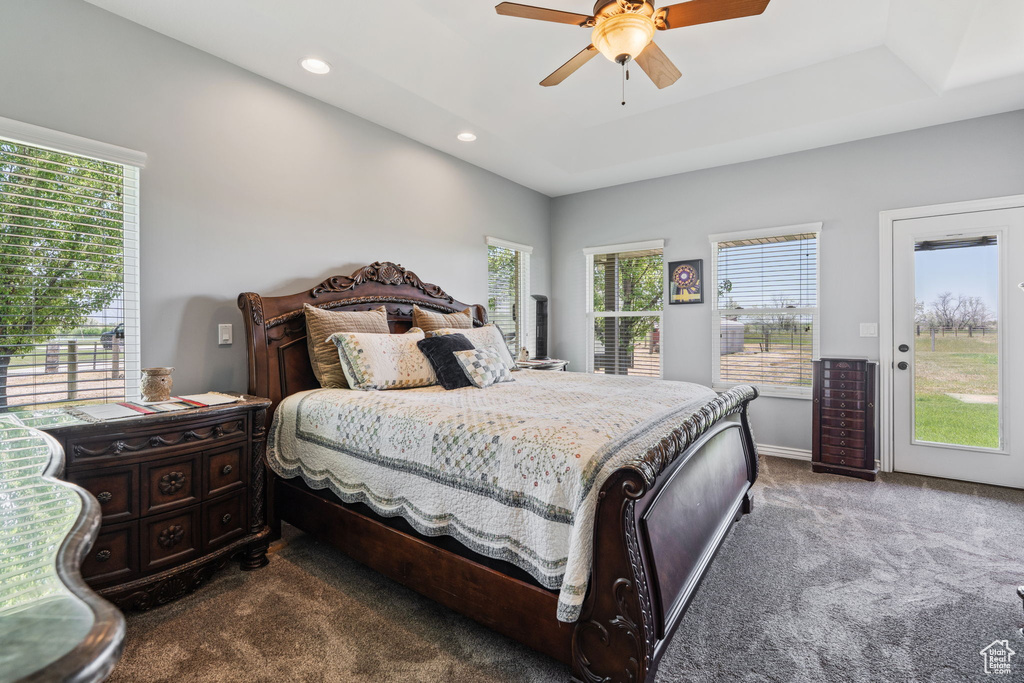 Bedroom featuring carpet flooring, access to outside, multiple windows, recessed lighting, and ceiling fan