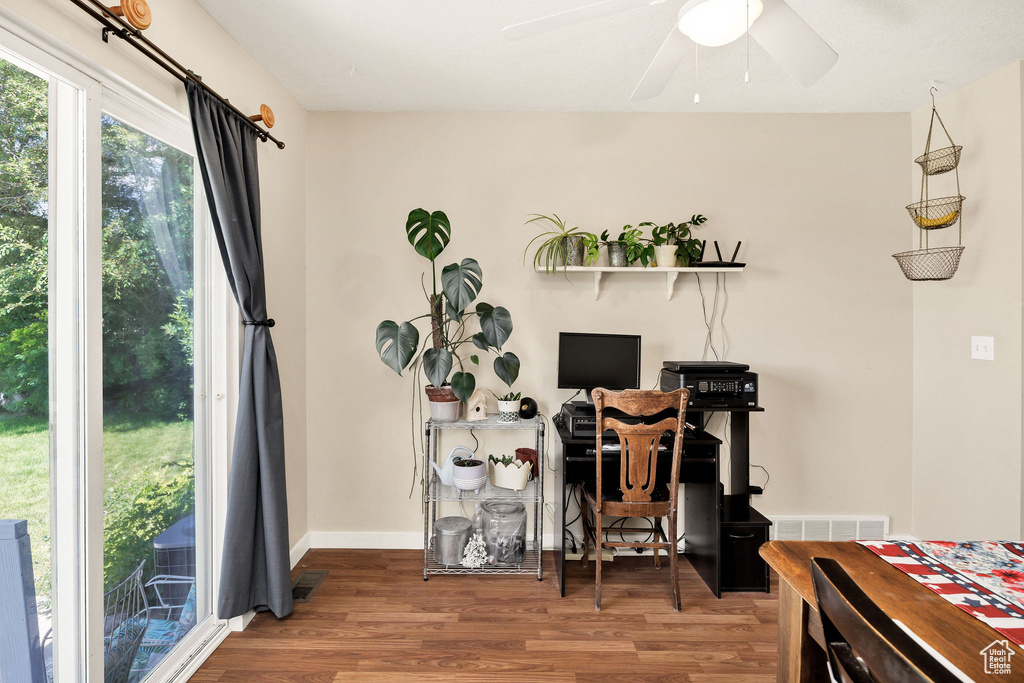 Office featuring wood finished floors and a ceiling fan