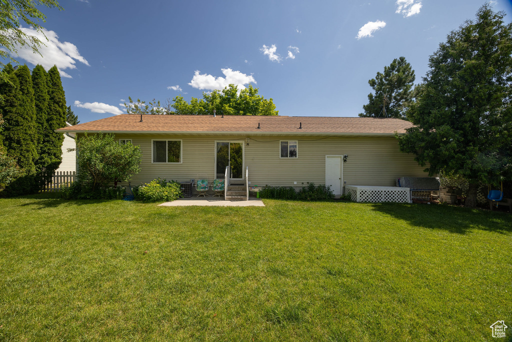 Back of property featuring a patio area and entry steps