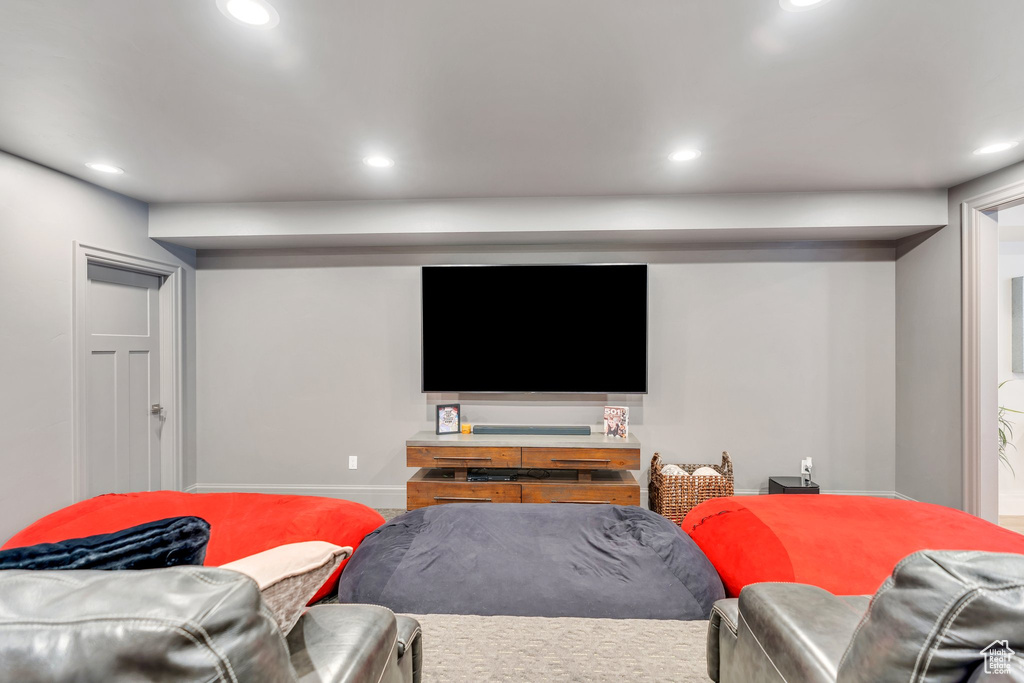Cinema room featuring recessed lighting and baseboards