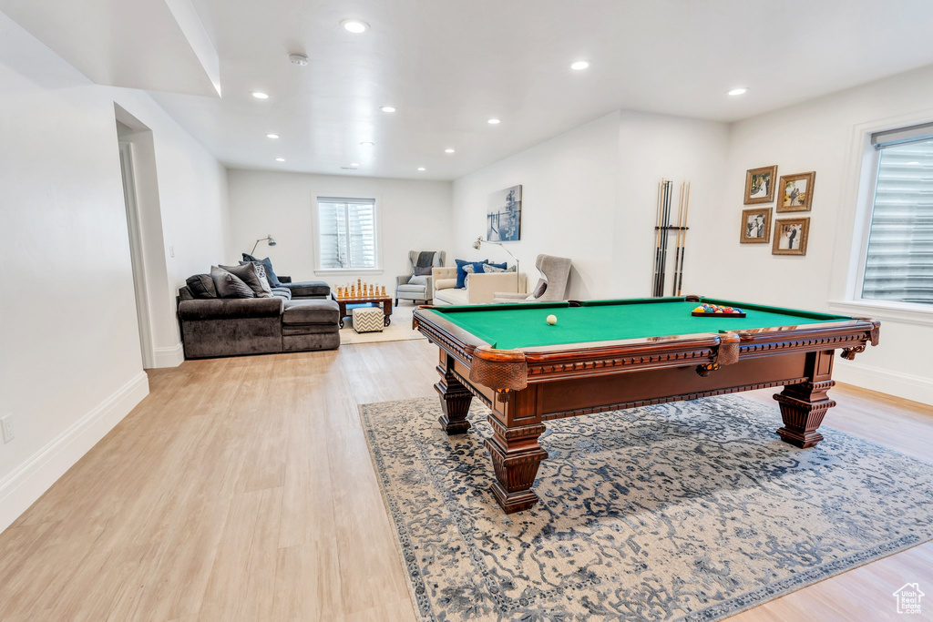 Game room with light wood-style flooring, billiards table, and recessed lighting