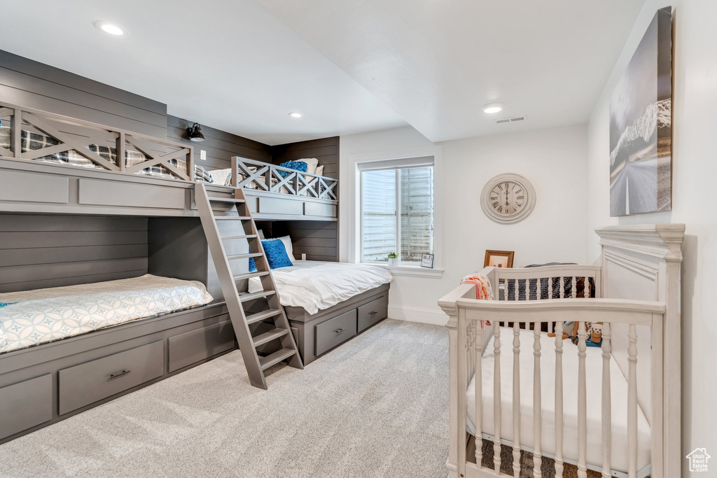 Bedroom with carpet floors and recessed lighting