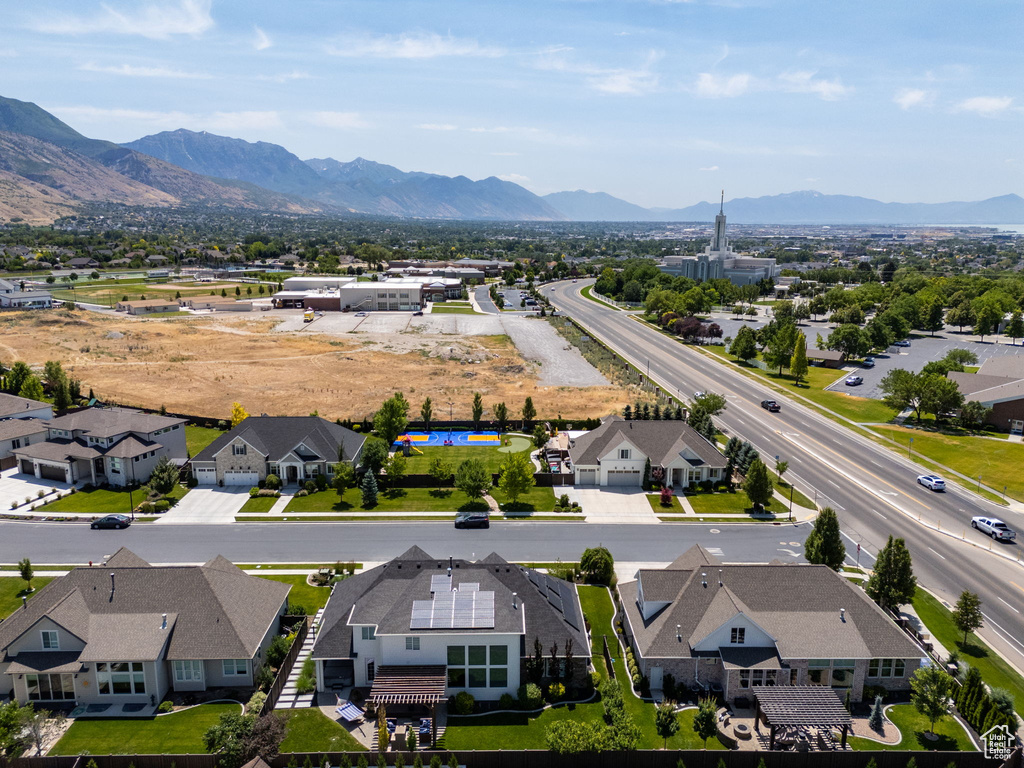 Aerial view of residential area with a mountainous background