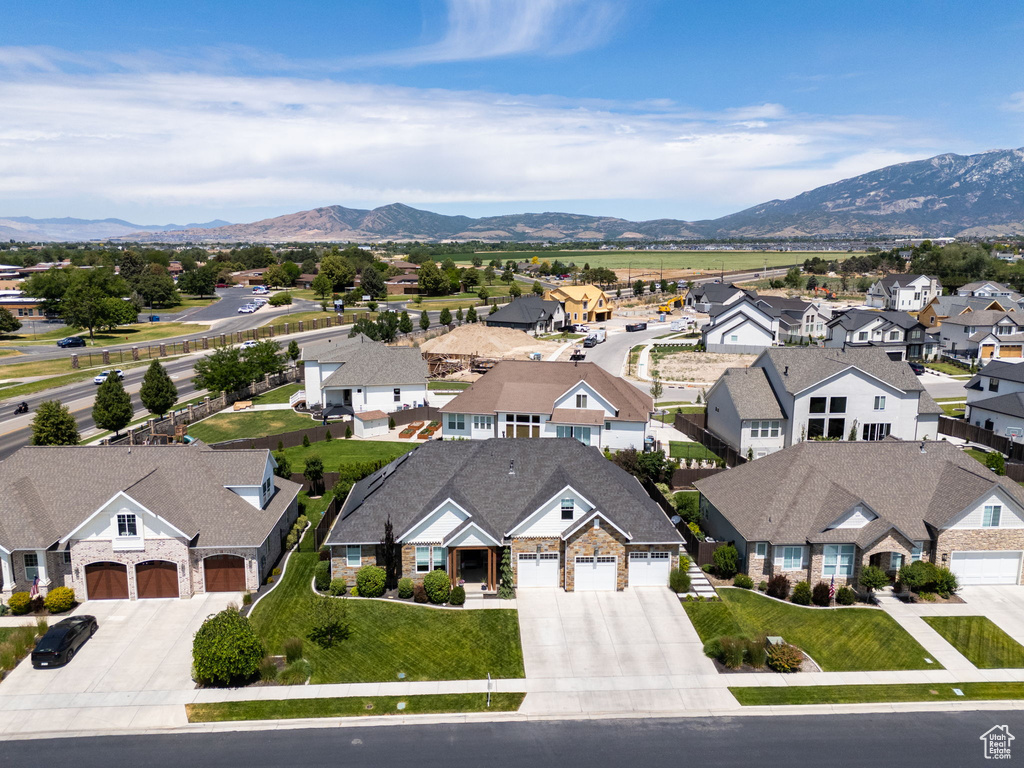 Aerial view of residential area featuring mountains