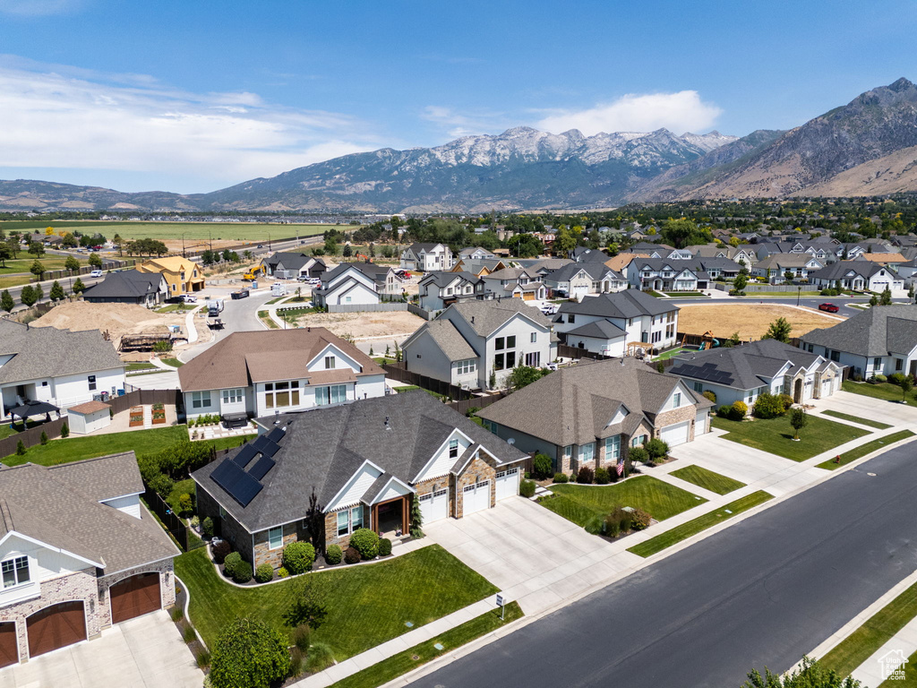 Aerial view of residential area with a mountain backdrop