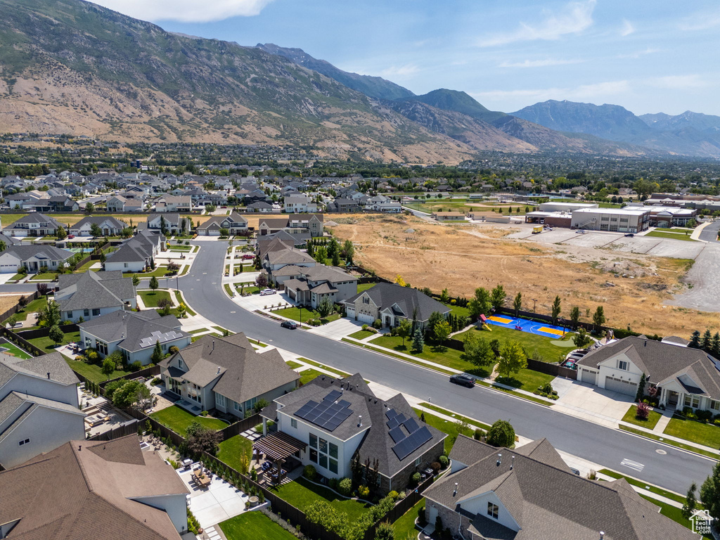 Aerial perspective of suburban area featuring mountains