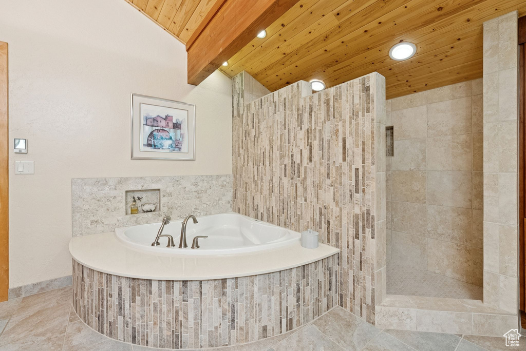 Full bathroom featuring a garden tub, walk in shower, a wooden ceiling with exposed beams, tile patterned floors, and recessed lighting
