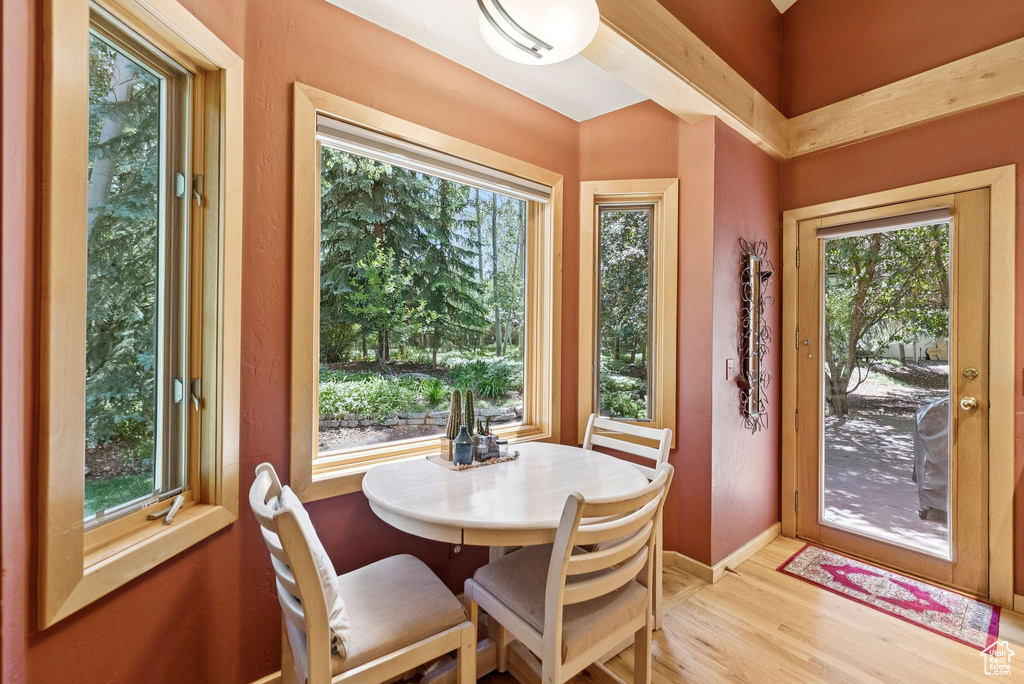 Dining space featuring plenty of natural light and light wood-style floors