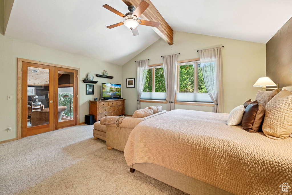 Bedroom featuring light colored carpet, access to outside, and a ceiling fan