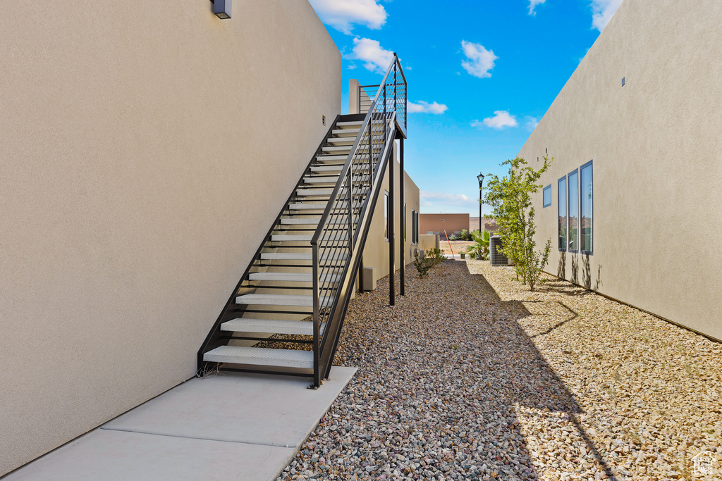 View of home\\\\\\\\\\\\\\\'s exterior with stucco siding and stairs