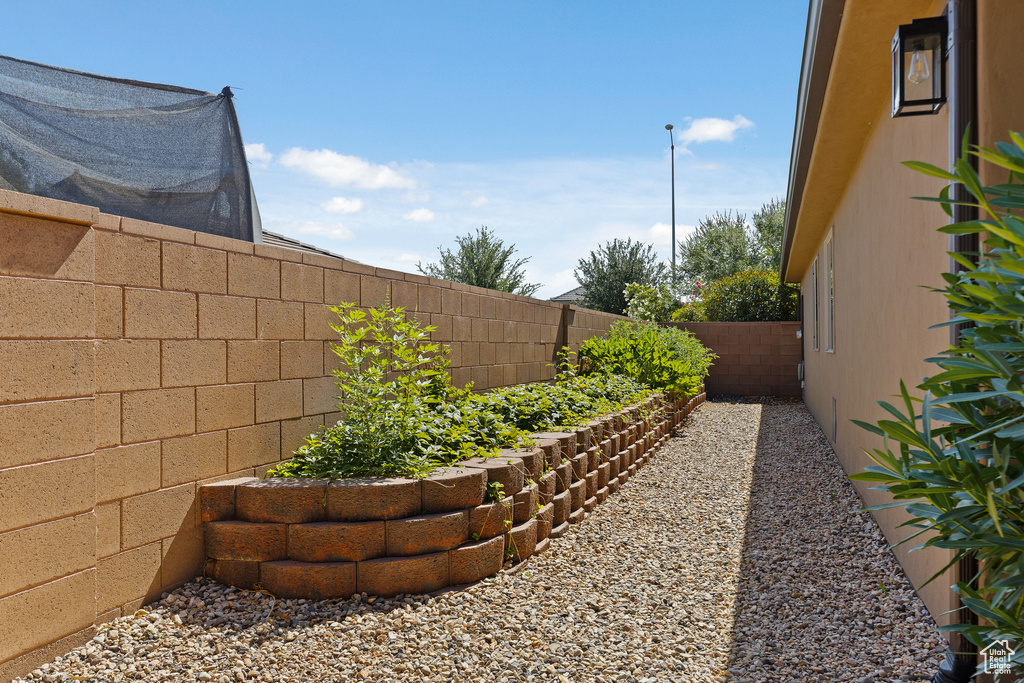 View of fenced backyard