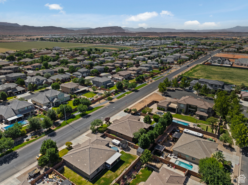 Aerial view of residential area with a mountain backdrop