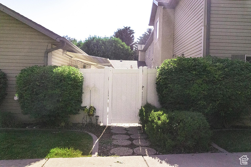 View of property exterior with a garage