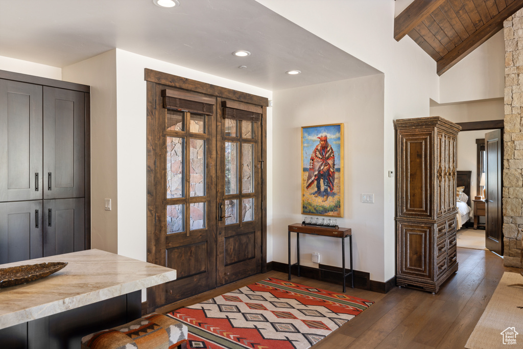 Foyer with hardwood / wood-style flooring and recessed lighting