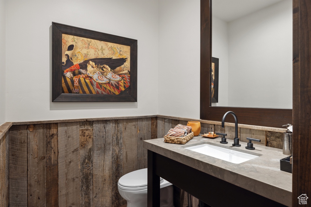 Bathroom featuring toilet and vanity