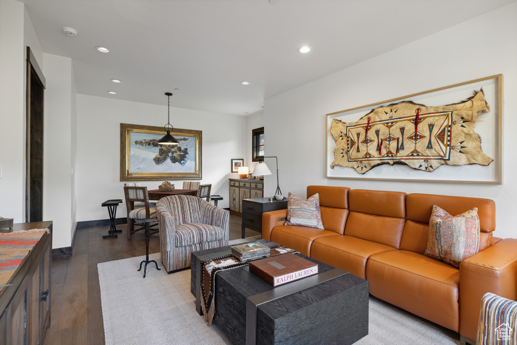 Living area featuring recessed lighting and wood finished floors
